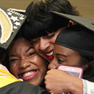 Graduates hugging