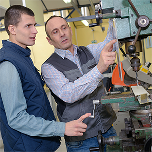 Welding student with instructor